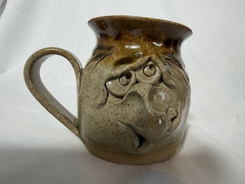 Pretty ugly pottery mug made - pretty,