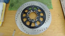 FRONT BRAKE DISC 29.8CM ACROSS  WHOLE 6.4CM CENTE HOLE SR XS CB SRX FZR FXR RD
