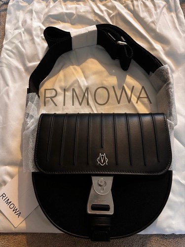 New rimowa never still cross - new,