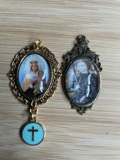 Two holy medals - two, of