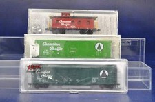 Micro Trains/Atlas N Gauge Rake of 2 50ft Box Cars with 34ft Cupola Caboose - Ca