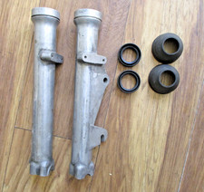 Pair of Triumph Bonneville T140 fork leg sliders for drum brake models inc seals