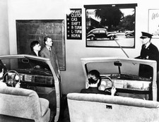 An instructor gives a driving