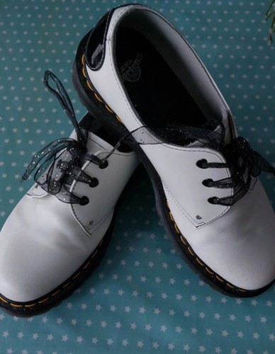 White with black hearts doc - white,