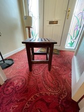 ANTIQUE PITCH PINE LUGGAGE STAND RACK WHICH HAS A FRETWORK TOP IT IS STAMPED