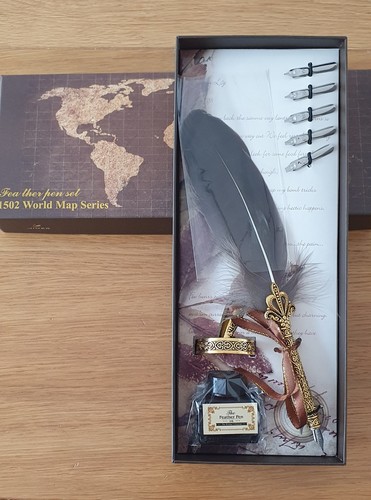 1502 world map feather pen - feather, set