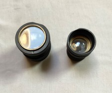 Two vintage brass lenses for