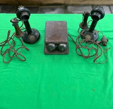 pair of antique GPO candlestick telephones and oak ringer box