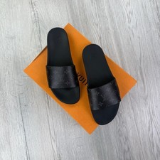 • Louis Vuitton Men’s