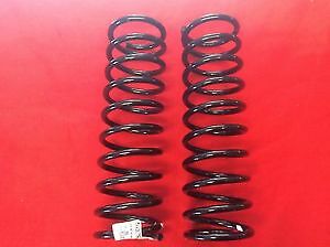 New pair front coil springs - new,