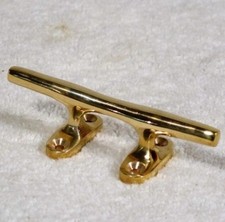 POLISHED BRASS CLEAT 4"