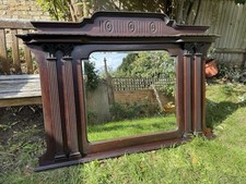 Mirror In Carved Wooden Surround Wall Mounted (typically above a fireplace)