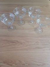 Set of 4 victorian/edwardian champagne glasses.  Fine glass. 10cm tall.