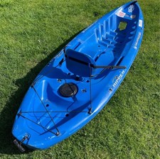 Blue single seater sit-on Wilderness Kayak. 96” long x 30” wide. Dry compartment