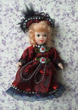 Vintage Victorian Style Porcelain Doll.Small,Jointed limbs with Burgundy Outfit.