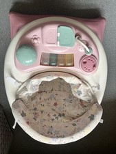 Baby Walker,the front lights up and plays songs.