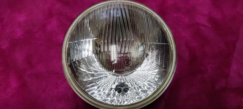 Used headlight optic never - optic,
