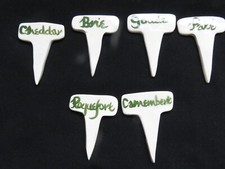 SIX GLAZED POTTERY CHEESE &