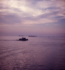 LOOKING OUT AT TUG BOAT &