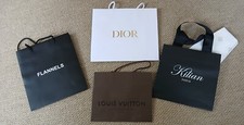 Louis Vuitton, Kilian Paris, Dior & flannels gift/store bags.