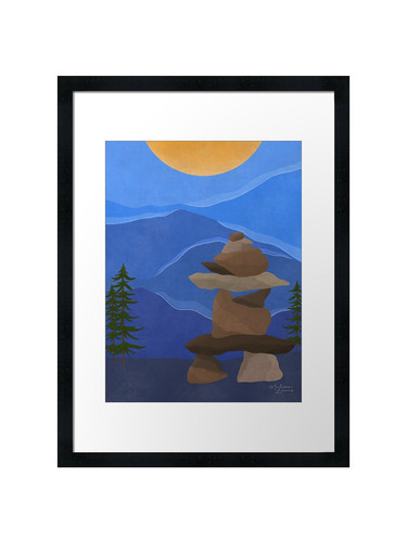 Inukshuk and mountains - and,