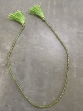 Peridot Faceted Rounds Strand