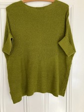 Oversized,  bat-wing sleeved