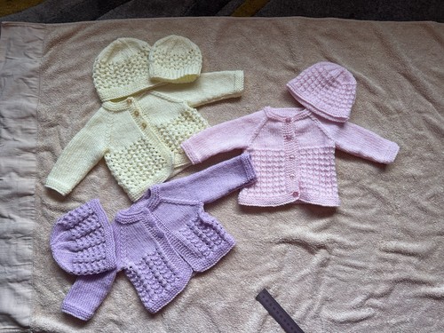 Hand knitted newborn baby - hand,