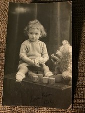 Early 20th c. RPPC Girl w/ Toy