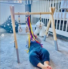 Wooden play gym frame activity