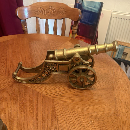 Brass cannon model wheeled - on,