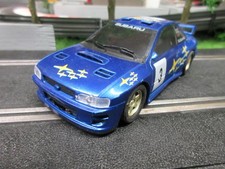 SCALEXTRIC C2240 SUBARU IMPREZA WRC FAST AND SERVICED. MANY NEW PARTS.