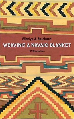 Weaving navajo blanket by - a,
