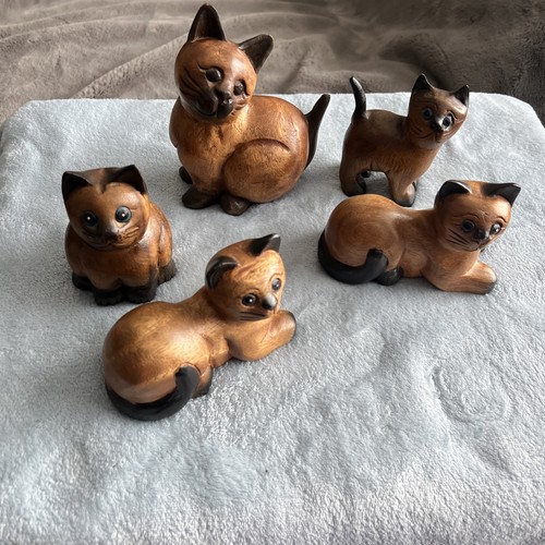 Hand carved wooden cat - hand,