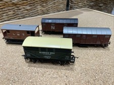 Four OO Mixed Wagons Including
