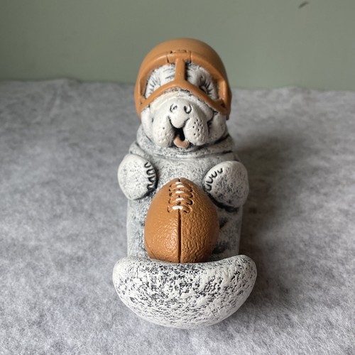 Stone walrus football door - stone,
