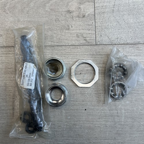 Cotterless axle spindle - axle, bb