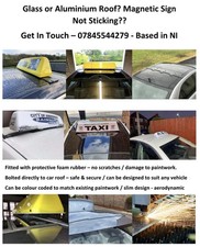 Taxi Sign see business page