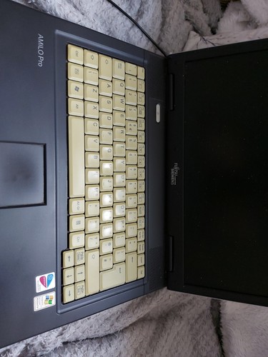 Fujitsu siemens amilo pro - fujitsu,