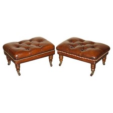 PAIR OF RESTORED BROWN LEATHER CHESTERFIELD TUFTED PORCELAIN CASTORS FOOTSTOOLS
