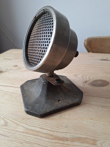 Old microphone likely from - likely,