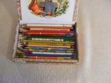 vintage cigar box full of pencils some with adverting/disney printed on them