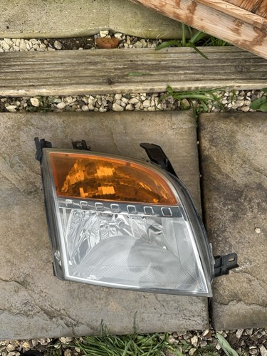 Ford fusion driver headlight - ford,