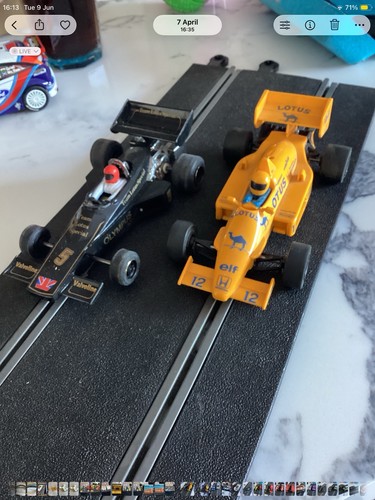 Two scalextric cars - two,