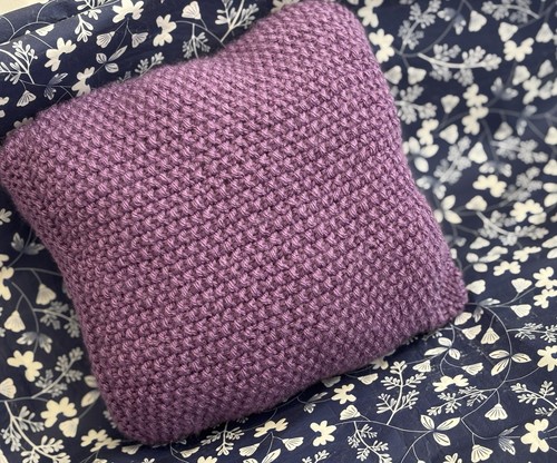 Hand knitted cushion size - hand,