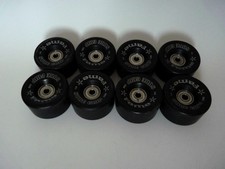 Set of 8 Sure Grip Roller Skate Fame 57mm 95a Black with 7mm Bearings