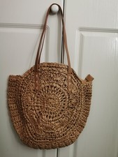 Hand-woven straw tote bag with
