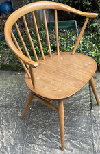 FINE RETRO ERCOL COWHORN
