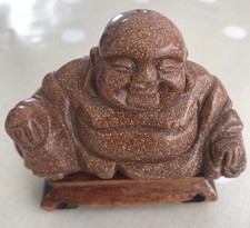 Red Goldstone Buddha On Plinth