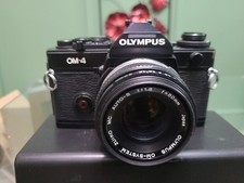 Olympus OM-4 35mm SLR Film Camera Body Black and 50mm F/1 Lens